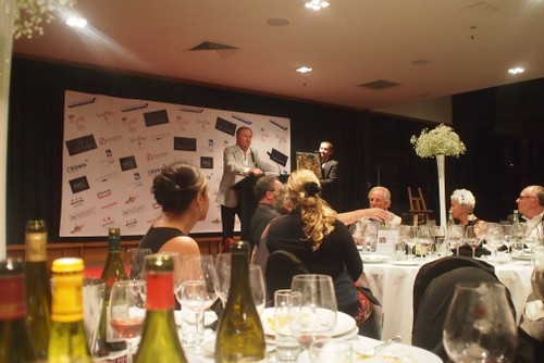 John Hawkesby conducting the charity auction