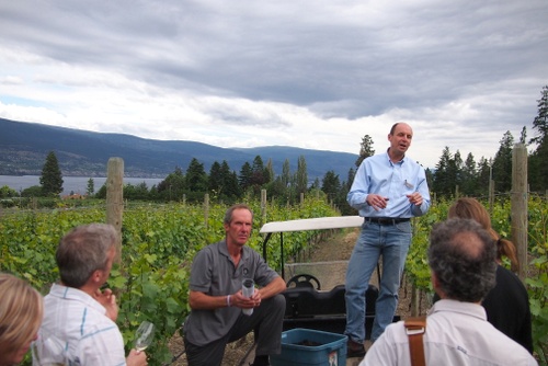 Michael Bartier addressing thr group in the Switchback vineyard, along with vineyard manager Theo Siemens